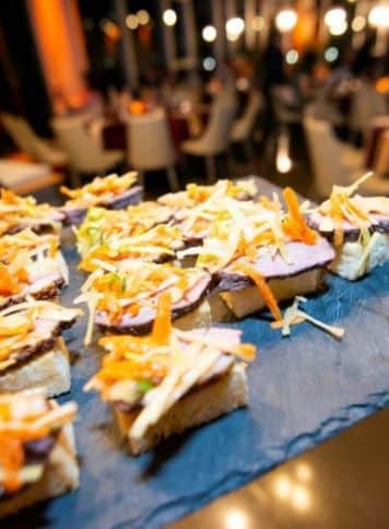 A plate of appetizers at a corporate event catering